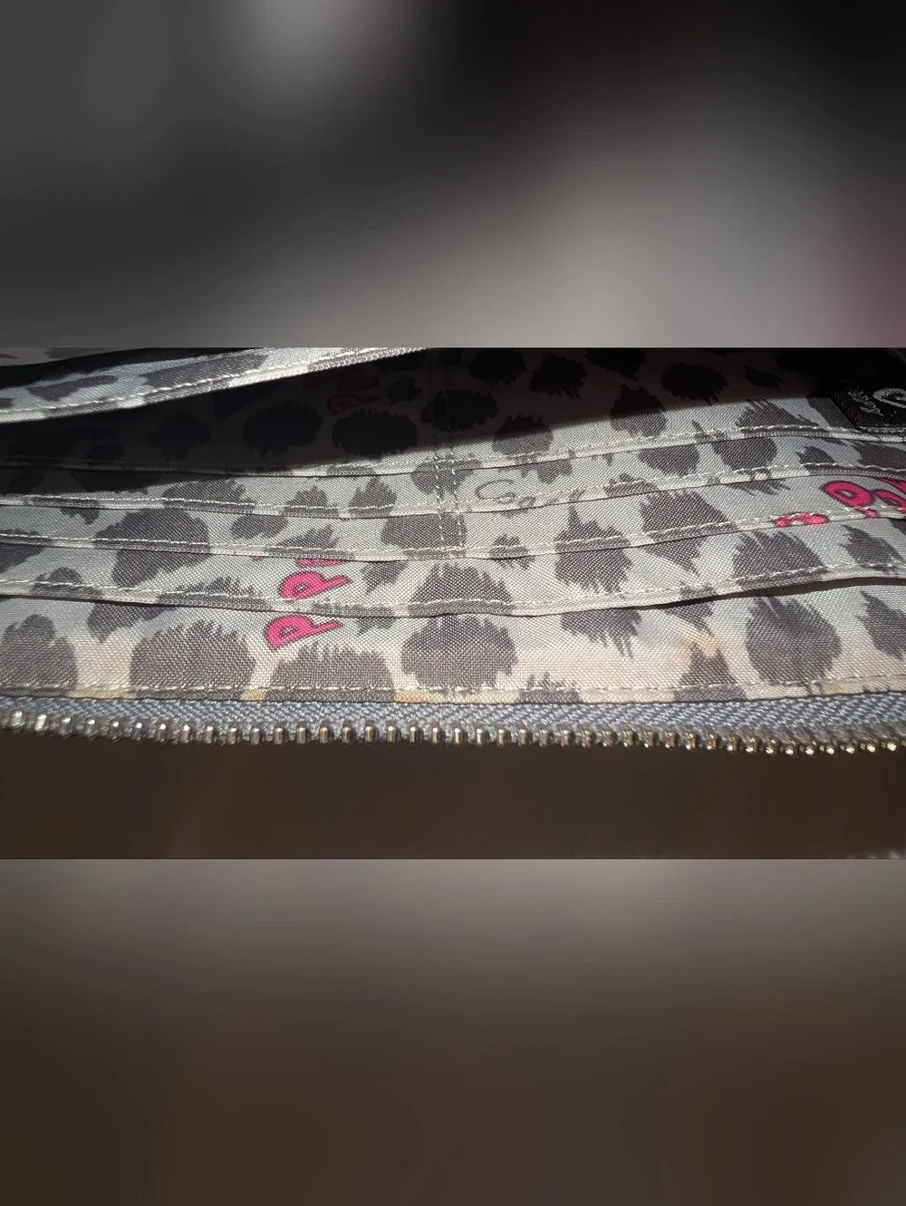 Coach sleek metallic
